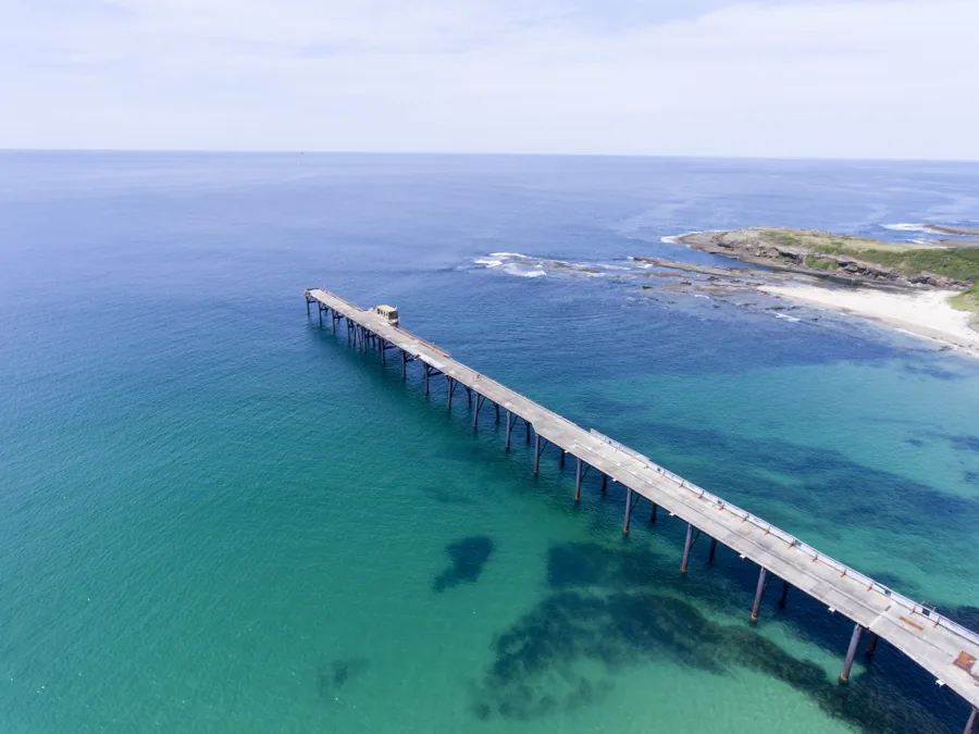Jetty over turquoise water on the Central Coast