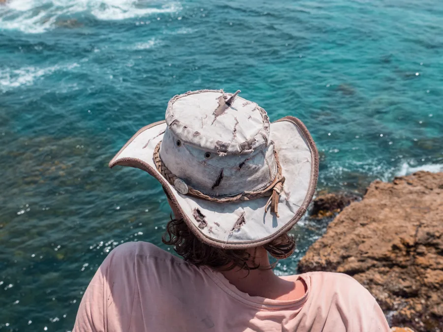 Looking out over clear turquoise water on the coast